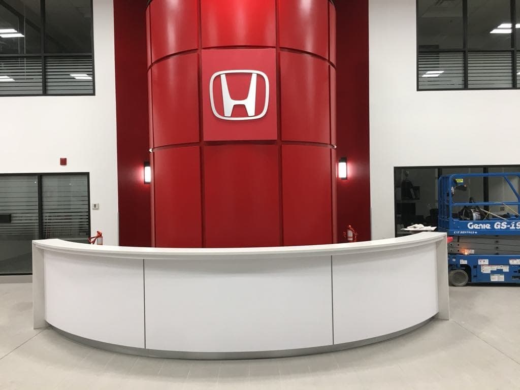 Empira Black Quartz countertop — Showroom service desks at Crown Honda, Winnipeg