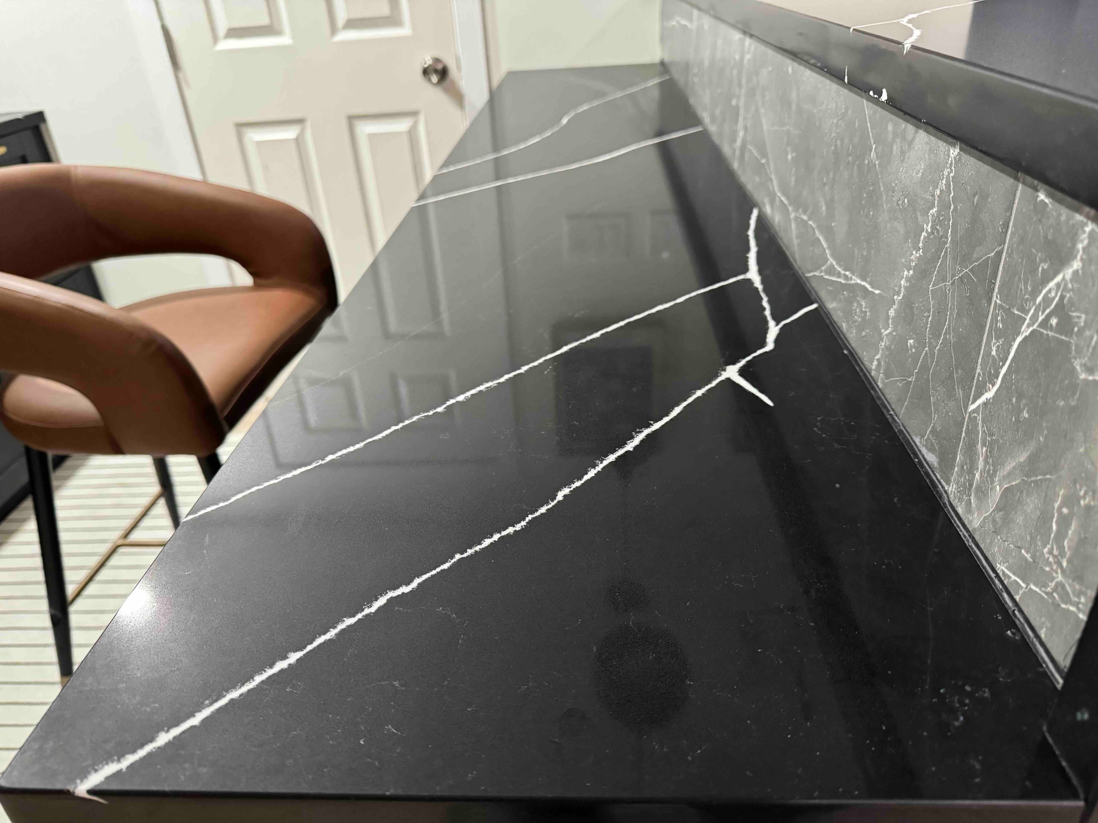 Empira Black Quartz countertop — Lower-level wet bar in Linden Woods, Winnipeg