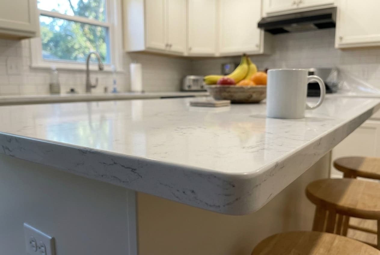 Calacatta Laza Quartz countertop — Designer kitchen reno in Crescentwood, Winnipeg