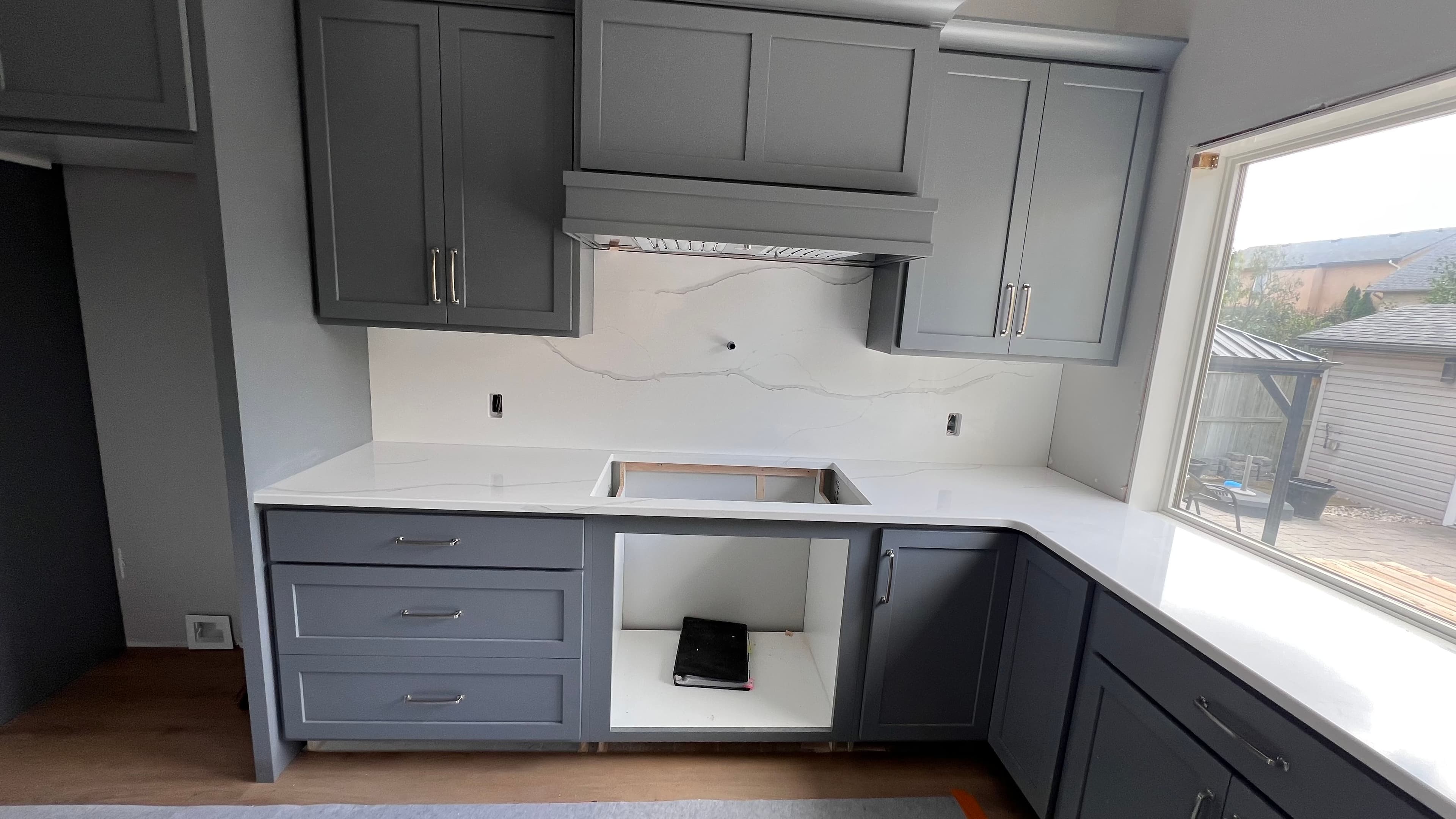 Frosty Carrina Quartz countertop — New build kitchen in Bridgwater Forest, Winnipeg