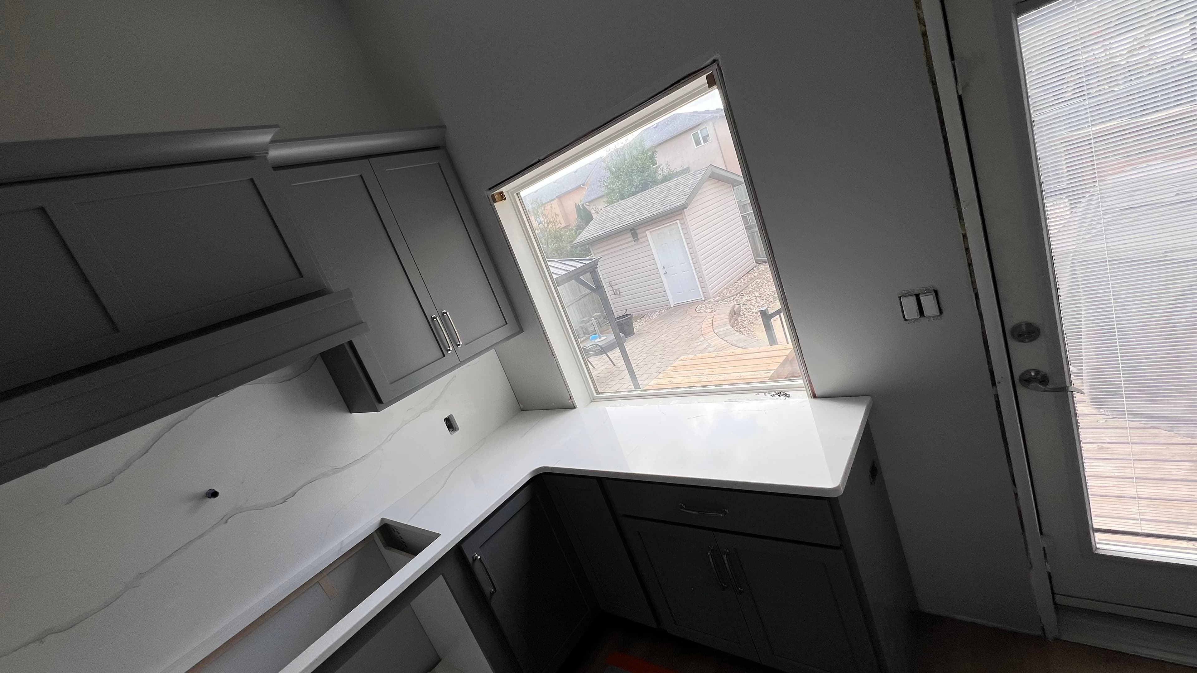 Frosty Carrina Quartz countertop — New build kitchen in Bridgwater Forest, Winnipeg