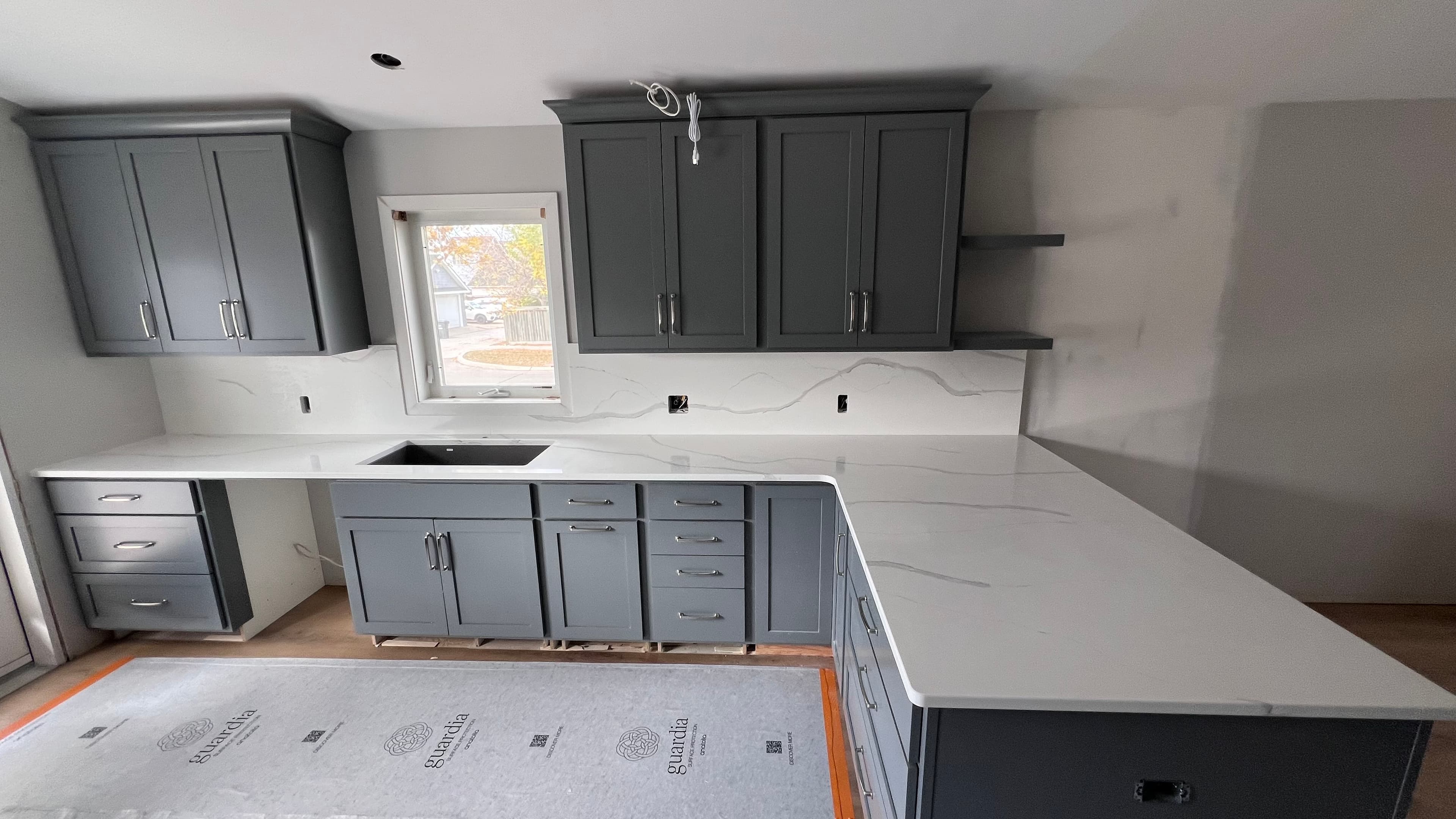 Frosty Carrina Quartz countertop — New build kitchen in Bridgwater Forest, Winnipeg