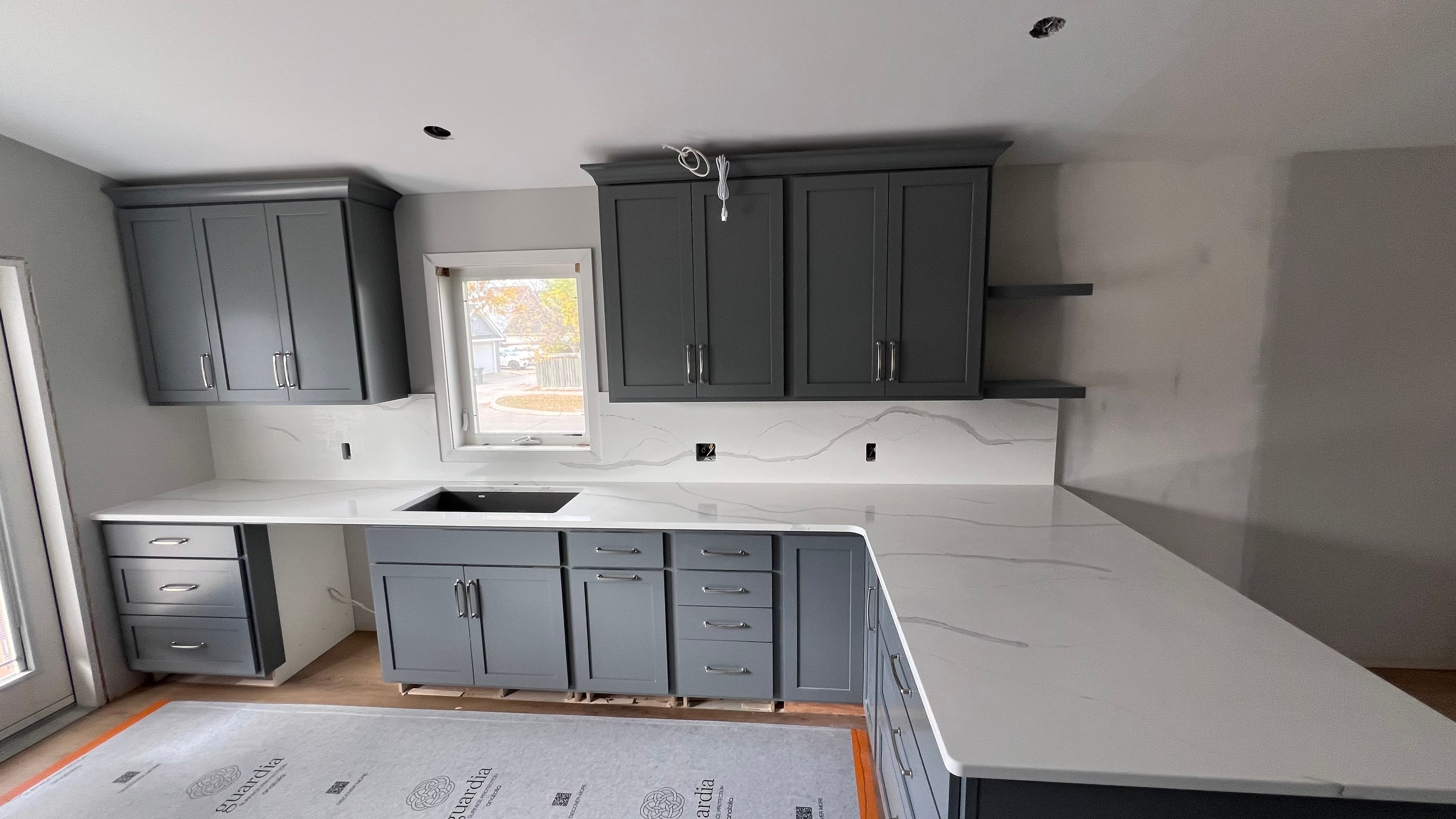 Frosty Carrina Quartz countertop — New build kitchen in Bridgwater Forest, Winnipeg