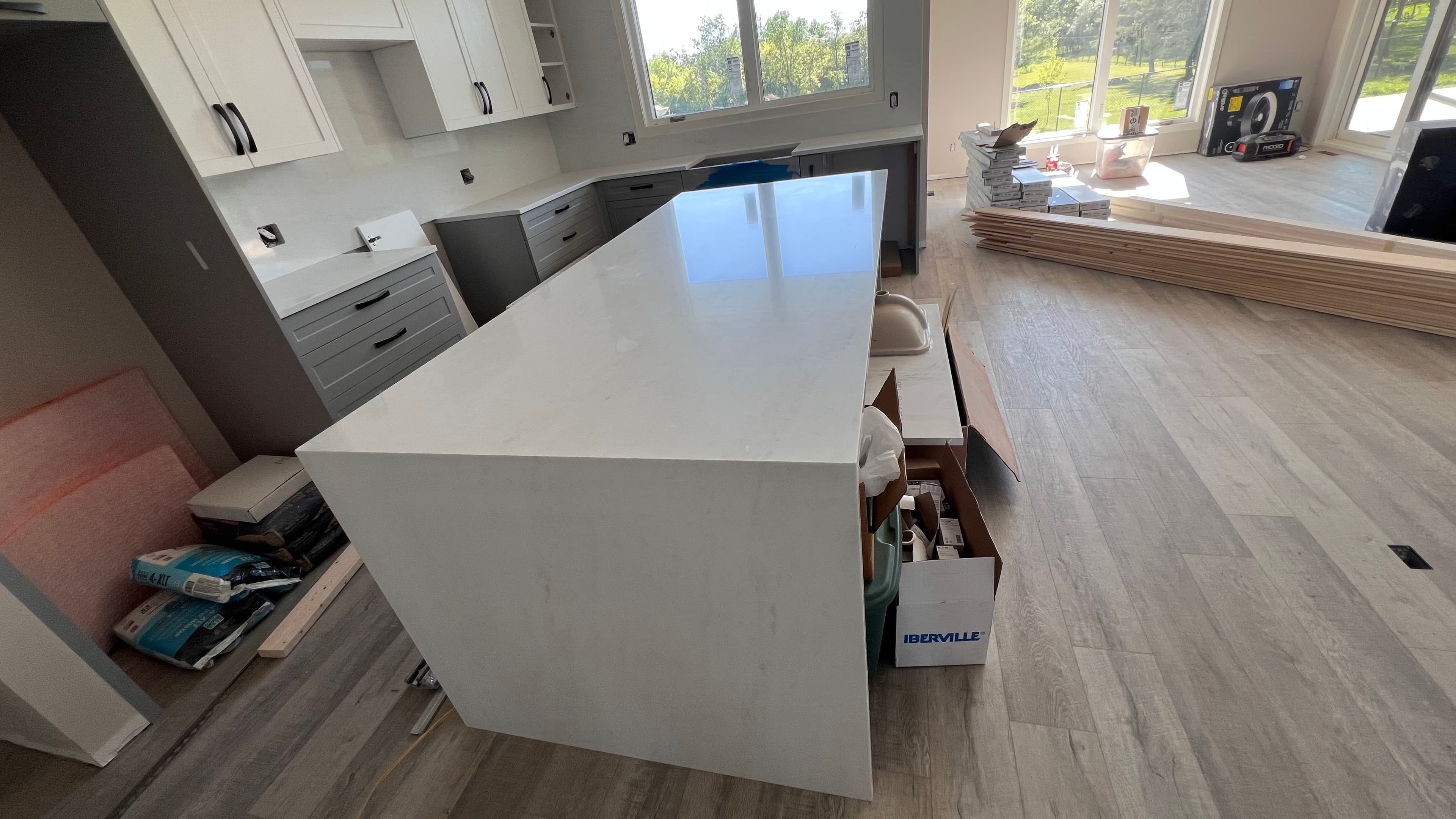 Taj Mahal Quartzite countertop — Open-concept reno in Sage Creek, Winnipeg