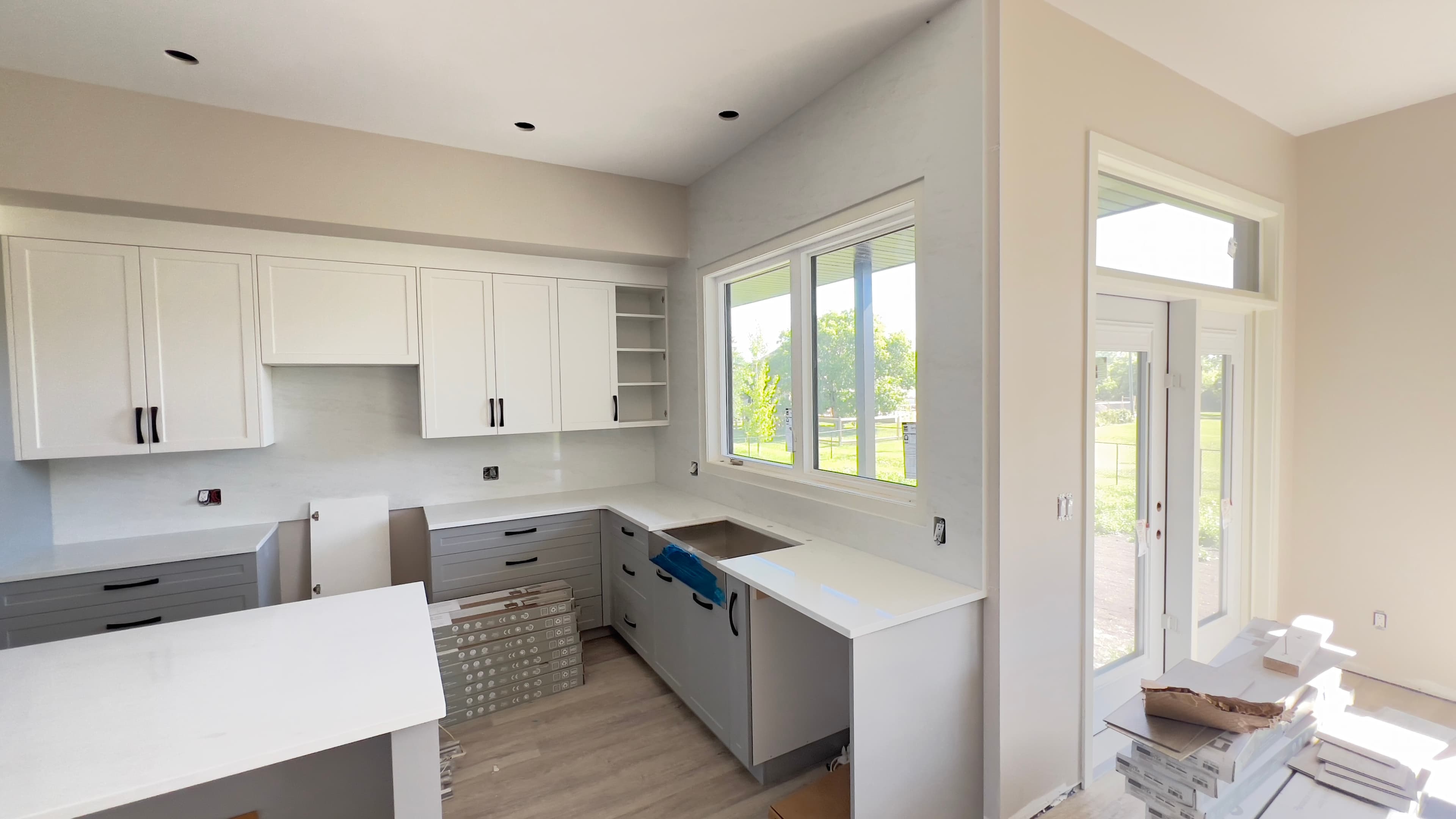 Taj Mahal Quartzite countertop — Open-concept reno in Sage Creek, Winnipeg