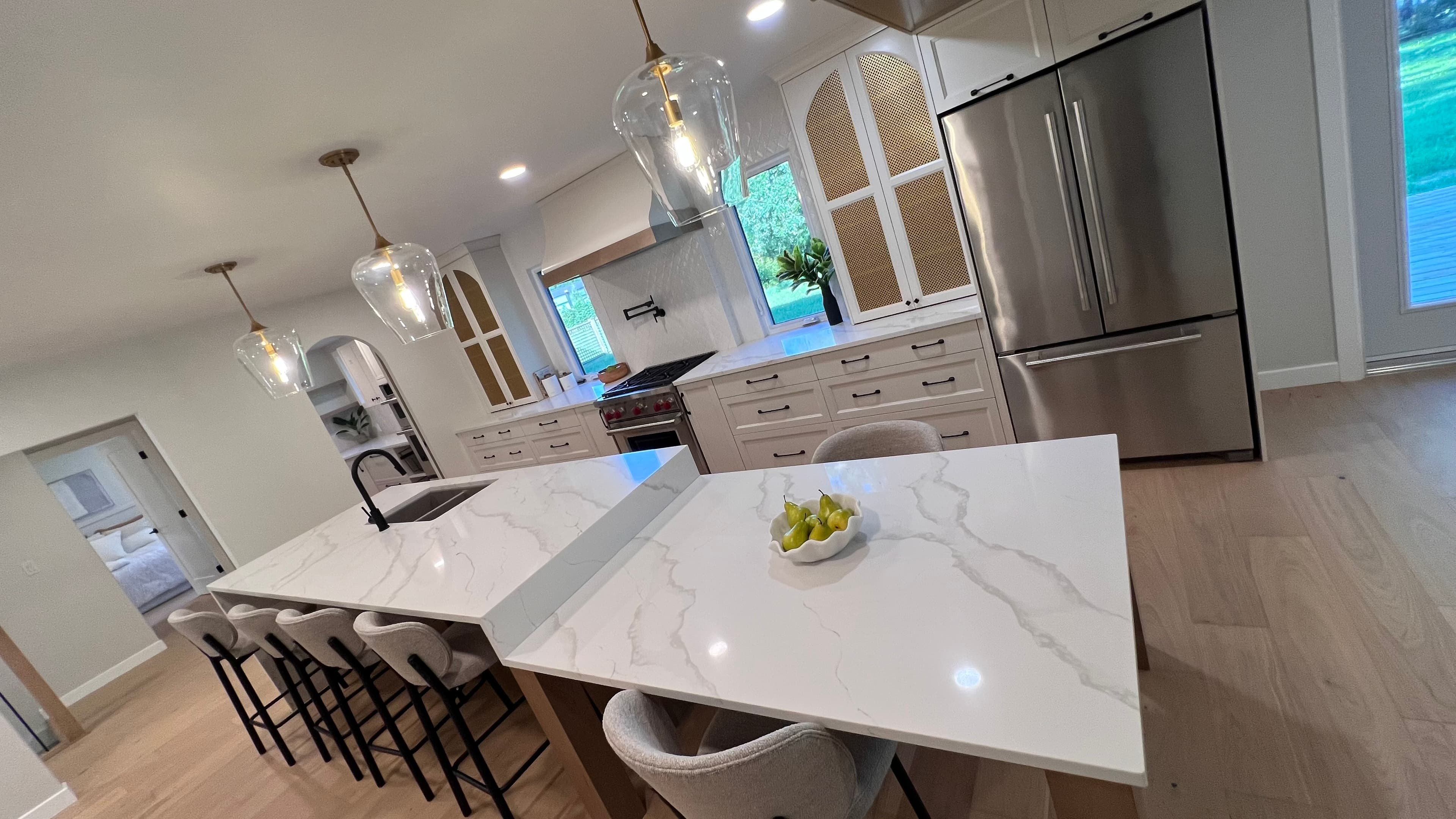 Calacatta Gold Quartz countertop — Kitchen + butler's pantry in Tuxedo, Winnipeg
