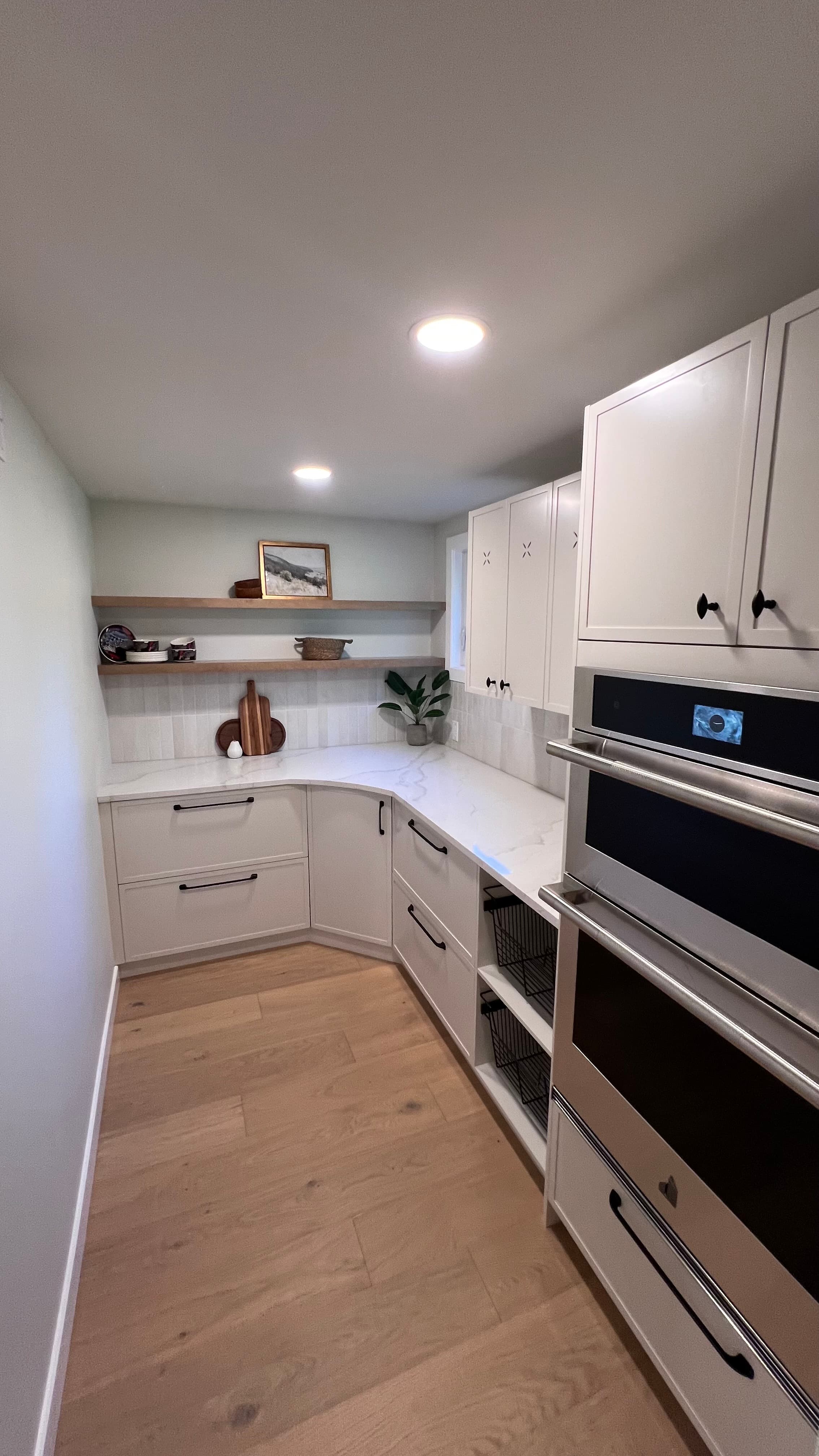 Calacatta Gold Quartz countertop — Kitchen + butler's pantry in Tuxedo, Winnipeg